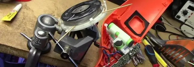 Vacuum cleaner repair parts and tools on a workbench in Jacksonville, FL